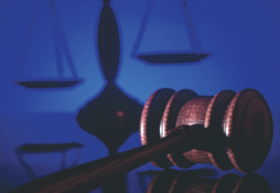 Dark Gavel and Scales of Justice (Stock Image)