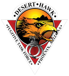 The Desert Hawk Fugitive Task Force was founded in 1992 as a joint effort between the FBI’s Phoenix, Arizona, office and local law enforcement agencies to target violent fugitives and repeat offenders for arrest. The task force currently is staffed by two special agents and members of the Maricopa County Sheriff’s Office, Mesa Police Department, and Scottsdale Police Department. Its diamond-shaped patch features a vigilant eagle over a background of the sun rising above the desert. The bottom of the patch depicts a set of handcuffs, a symbol of the task force’s great success since its inception.
