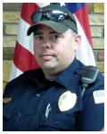 Officer Matt McCaslin and Sergeant Mike Chretien of the Powell, Wyoming Police Department helped several guests, including an unconscious man, escape from a hotel fire. Chretien was a Bulletin Notes recipient in February 2012.