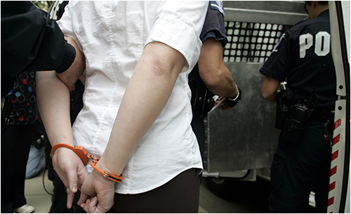 Female in Handcuffs (Stock Image)