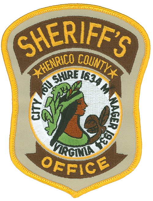 The patch of the Henrico County, Virginia, Sheriff’s Office honors local heritage. Pocahontas symbolizes a prominent figure in early American history. The tobacco leaves depict John Rolfe’s (Pocahontas’ husband) new strain of the plant, which gave the New World its first cash crop and brought prosperity to Henrico and Virginia. The Indian corn on the seal represents the nurturing soil of the local area and the gift of corn to early settlers.