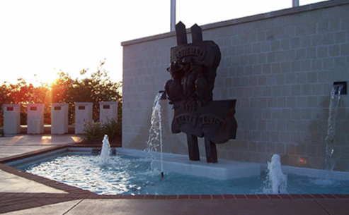 Depiction of statuary at the Louisiana State Police Memorial.
