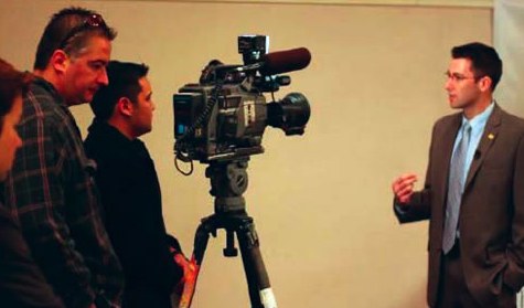Man Being Interviewed on Camera