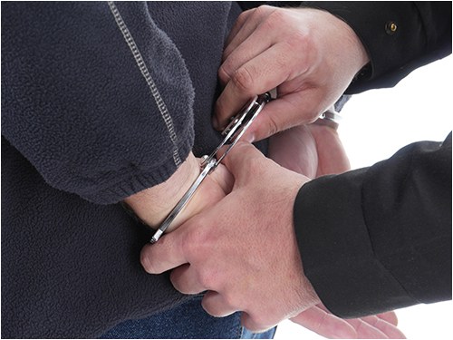 Man in Handcuffs (Stock Image)
