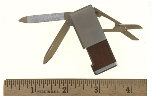 This metal money clip conceals a blade, nail file, and scissors. Offenders may attempt to use it against law enforcement officers.