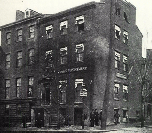 A photograph of the DC police headquarters in the latter half of the 19th century.