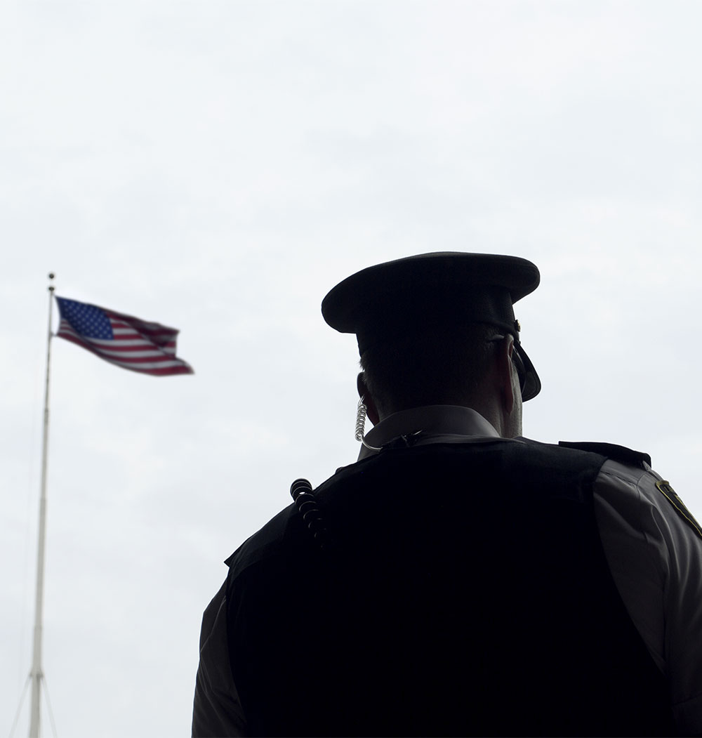 Police Officer and American Flag