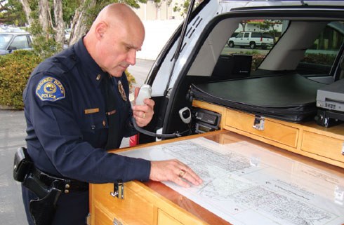 Officer Looking at Diagram