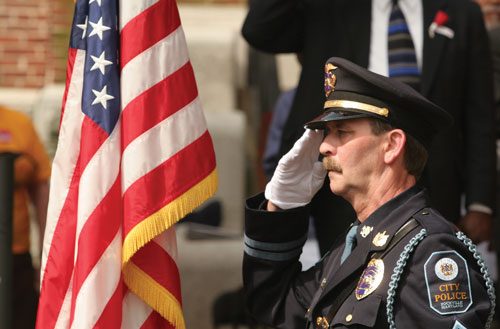 Officer Saluting Flag