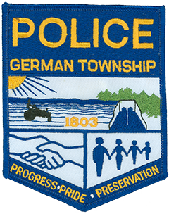  German Township in Montgomery County, Ohio, is one of five townships statewide with the same name. The city of Germantown is its respective municipality and home to the German Township Police Department. The department’s service patch depicts the township logo, representing a friendly rural community at the bottom and showing spacious farmland and a local dam at the top. The area first was organized in 1803 by German-speaking settlers from Berks County, Pennsylvania—this founding year is shown at the center of the patch.