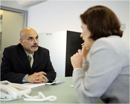 Manager Talking With Employee (Stock Image)