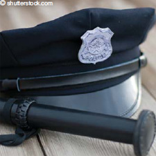 Depiction of an officer's hat and baton.