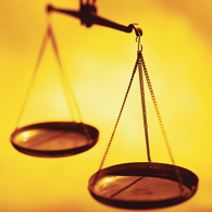 Stock image of scales, representing justice. © Photos.com