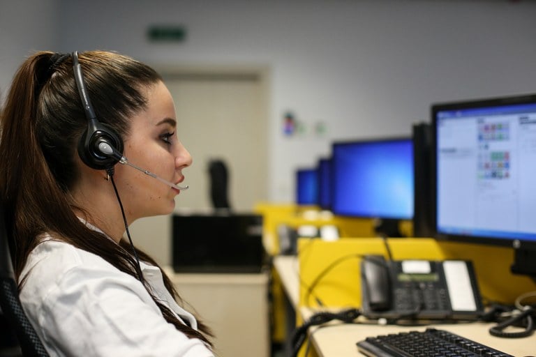 A stock image of a 911 dispatcher.