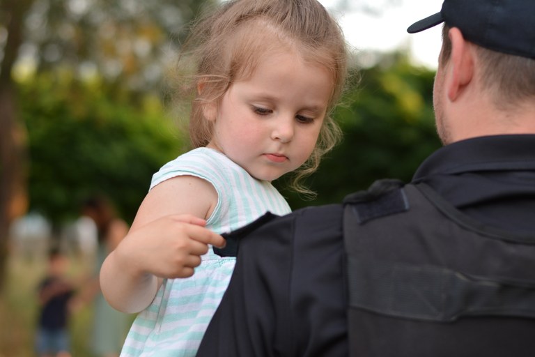 Male Officer With Daughter