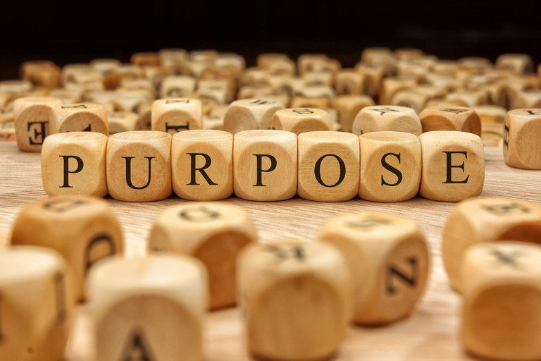 A stock image of the word Purpose spelled out using blocks.
