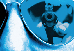 Sunglasses with Reflection of Gun (Stock Image)