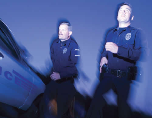 Two Police Officers Running