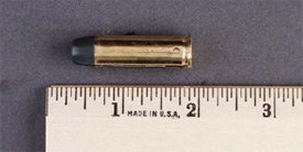 This photo depicts what appears to be a cartridge in a metallic case. Instead, a metal blade is inside the cartridge.